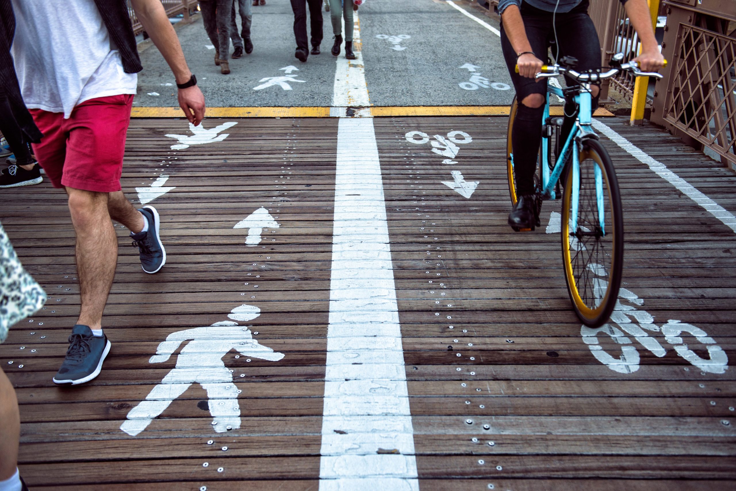 Pedestrian,And,Bicycle,Riders,Sharing,The,Street,Lanes,With,Road Pedestrian,And,Bicycle,Riders,Sharing,The,Street,Lanes,With,Road